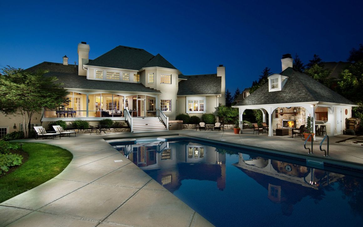 Backyard pool and spa with mood lighting and audio integration