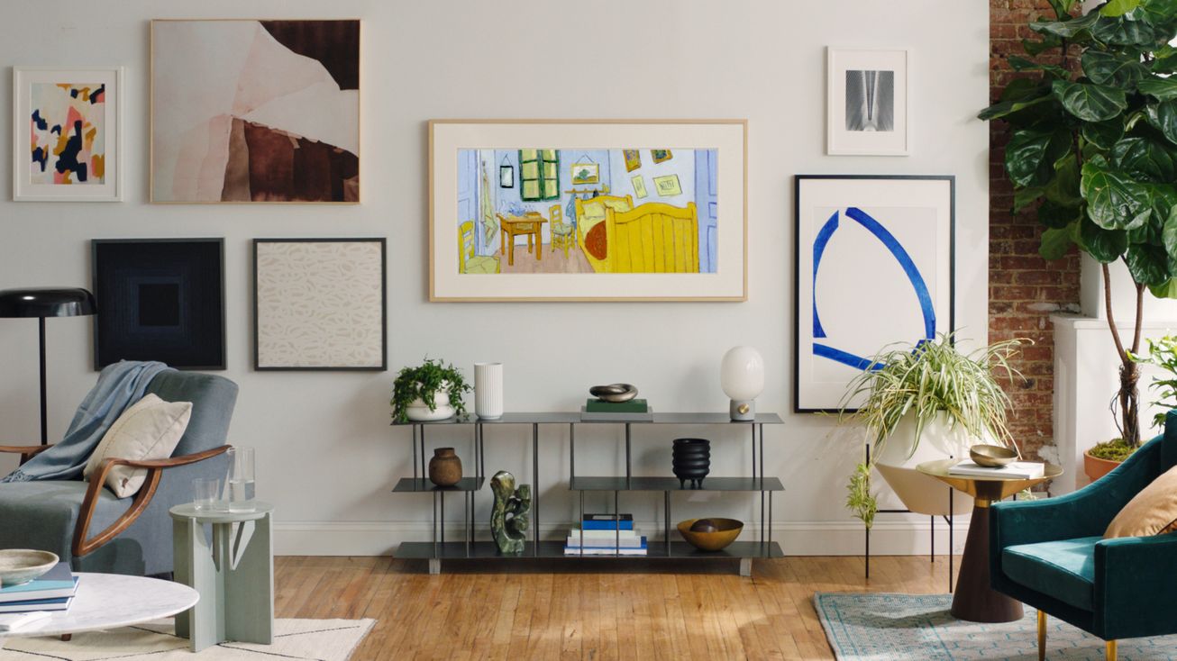 Television concealed behind artwork in refined living room